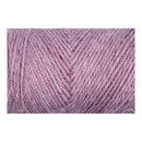 A close-up of variegated pink and light purple yarn wound into skeins, shown against a plain white background.