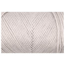 A close-up of a skein of light oatmeal-colored yarn, showing the detailed texture of the twisted cotton/plastic fibers.