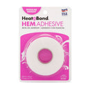 Heat'n Bond HEM Adhesive Regular Weight hem stitchers in a pink and white blister pack.