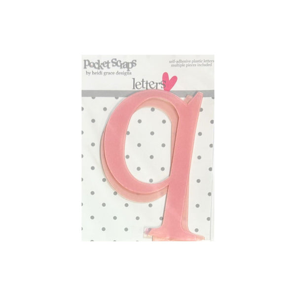 A pink self-adhesive plastic letter 'q' from the 'Pocket Scapes' brand, shown on its original retail backing card against a white background.