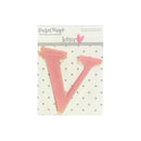 A pink plastic letter 'V' from the 'Pocket Scrap' set by Heidi Grace Design, shown in its original retail packaging with a white polka-dot backing card.