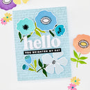 Card with colorful flowers and text on a light blue background