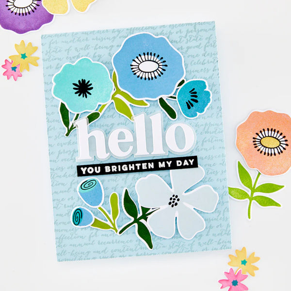 Card with colorful flowers and text on a light blue background