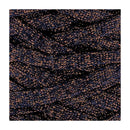 A close-up of a textured fabric or material swatch with a black base and dense diagonal streaks of warm metallic copper-gold and dark navy blue.