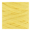 A close-up of a pale yellow braided cord or ribbon texture filling most of the frame, with a thin white border around the edges.