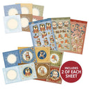 A set of Christmas-themed sticker sheets and matching card templates arranged on a white background, with a red circular badge that says 'INCLUDES 2 OF EACH SHEET'. The designs feature penguins, Santa Claus, snowflakes, and holiday motifs in pastel blue, beige, green, and red tones.