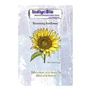 IndigeBlu 'Blooming Sunflower' rubber stamp package featuring a watercolor-style yellow sunflower illustration on a distressed light blue background with product text.