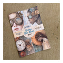 A book titled 'Vintage Blue Steam Book 1' by InStyleBros, featuring a steampunk collage cover with goggles, a pocket watch, and vintage illustrations, placed on a textured tan background.