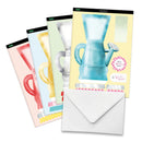 Set of greeting cards with watering can designs and a white envelope on a white background
