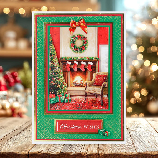 Christmas card with a decorated room, tree, and fireplace on a wooden surface with festive background.