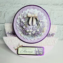 Decorative card with floral design and 'thinking of you Always' message on a textured surface.