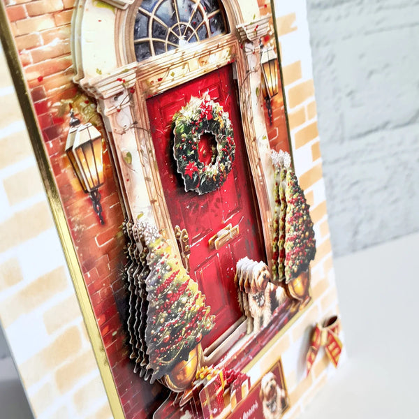 Decorative Christmas card with a red door and wreath on a brick wall background