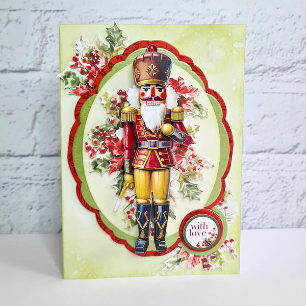Christmas card with a nutcracker design on a light green background