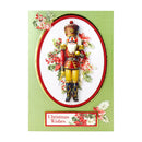 Christmas card with a nutcracker design and 'Christmas Wishes' text on a green background.