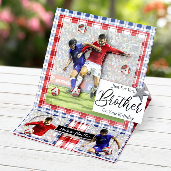 Birthday card for a brother with soccer-themed design on a wooden surface.
