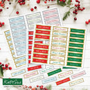 Sheet of Christmas-themed labels with various greetings on a white surface with red berries and greenery.