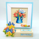 Decorative birthday card with flowers and text on a white background