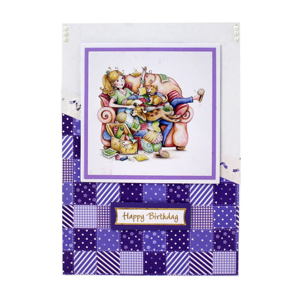 Birthday card with a colorful design of a girl and dog on a patchwork background.