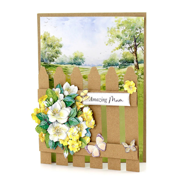 Card with floral design and 'Amazing Mum' message on a wooden fence background