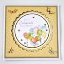 A square greeting card with a layered design, featuring a central white oval with the text 'Let's Celebrate You Today' and colorful watercolor balloons, surrounded by a scalloped gold border on a patterned yellow background with butterfly accents.