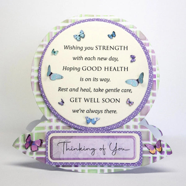A 3D pop-up greeting card with a circular message that reads 'Wishing you STRENGTH with each new day, Hoping GOOD HEALTH is on its way. Rest and heal, take gentle care, GET WELL SOON we're always there.