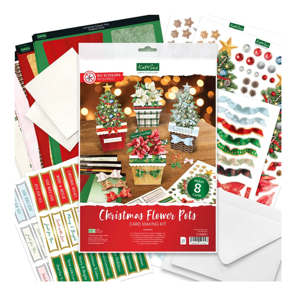 A Christmas Flower Pots card making kit by Kelly's Creations, shown with its packaging and various included craft sheets, envelopes, and decorative elements arranged around it on a white background.