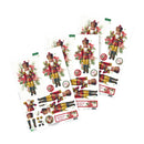 Three printed nutcracker-themed craft sheets with detachable pieces, shown on a plain white background. The sheets feature illustrated holiday nutcrackers in red and gold uniforms with green foliage and small circular decorative elements.