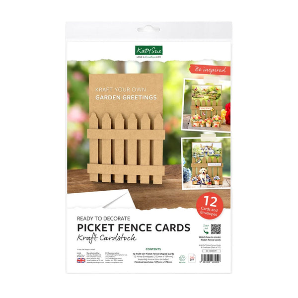 Kraft Cardstock 'Ready to Decorate' Picket Fence Cards in retail packaging. The white and green package shows a sample kraft paper picket fence card, smaller example images, and text indicating 12 craft cards and envelopes.