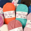 Colorful King Cole Big Value DK yarn balls with labels.