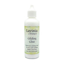 A bottle of Lavinia Stamps Gilding Glue with a white plastic cap and a white label featuring a light green watercolor border, set against a plain white background.
