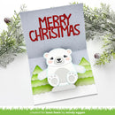A handmade Christmas pop-up card featuring a 3D white polar bear with pink cheeks and paw prints, set against a snowy mountain background with 'MERRY CHRISTMAS' in red text. The card is styled with artificial pine branches on a white surface.