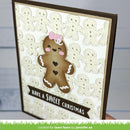 A handmade Christmas greeting card featuring a brown gingerbread man with a pink bow on a white patterned background, with a dark brown border and a banner reading 'HAVE A SWEET CHRISTMAS'.