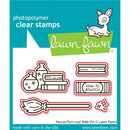 Lawn Fawn photopolymer clear stamps Add-On set featuring witch-themed illustrations including a broom, potion bottles, books, a wand, and a 'HOW TO BEWITCH' sign on a teal and white card.