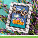 A handmade Halloween greeting card with 'spooky hugs' and 'Happy Halloween' text, featuring three jack-o'-lanterns with witch hats on a blue starry background. The card is displayed on a striped cardstock base and styled with purple flowers on a teal textured background.