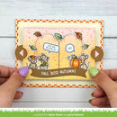 A handmade autumn-themed greeting card held by two hands against a white wood background. The card features cartoon mice, a pumpkin, fall leaves, and the text 'FALL INTO AUTUMN!' and 'CAN YOU BE COFFEE? YEAH!'.
