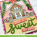 A handmade winter-themed greeting card or craft plaque featuring a gingerbread house with a dog window, candy canes, gingerbread figures, green leafy accents, and raised text reading “Wishing You a Sweet Cozy Winter.”.