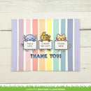 A handmade thank you card with pastel vertical stripes in lavender, pink, orange, yellow, green, blue, and purple. Three cartoon animals peek from behind the signs reading 'THX A LOTL', 'U MAKE ME CAPY', and 'THANK MEW', with 'THANK YOU!' in blue text below.