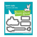 Lawn Fawn custom craft dies package featuring four metal die shapes: a speech bubble, a ticket, a bow tie, and a star, on a teal and white card with the Lawn Fawn logo.