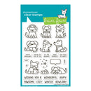 A sheet of Lawn Fawn photopolymer clear stamps featuring various cartoon dog illustrations in different poses and expressions, along with holiday-themed phrases and tags, on a teal and white backing card.