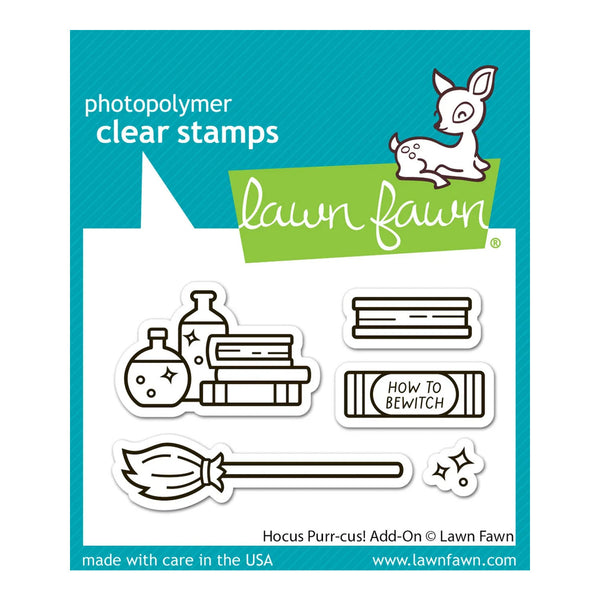 Lawn Fawn photopolymer clear stamps add-on sheet titled 'Hocus Purr-cus!', featuring witch-themed clear stamp designs including a broom, potion bottles, books, a 'HOW TO BEWITCH' sign, and sparkles on a branded teal and white backing card.