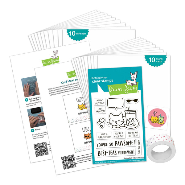 Lawn Fawn photo polymer clear stamps set with a 10-pack of clear stamps, instruction sheets, a sticker, and a roll of patterned tape on a white background.