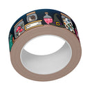 A roll of tape with a dark navy blue background and whimsical cartoon illustrations including a mushroom jar, book, potion bottle, witch hat, owl, and other small fantasy motifs. The inner core is light gray.