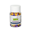 A small clear plastic jar with a white screw cap containing Halloween-themed star and moon clay pieces in purple, yellow, and white. The front label reads 'lawn fawndamentals tiny treasures' and 'Halloween moon and star clay pieces.
