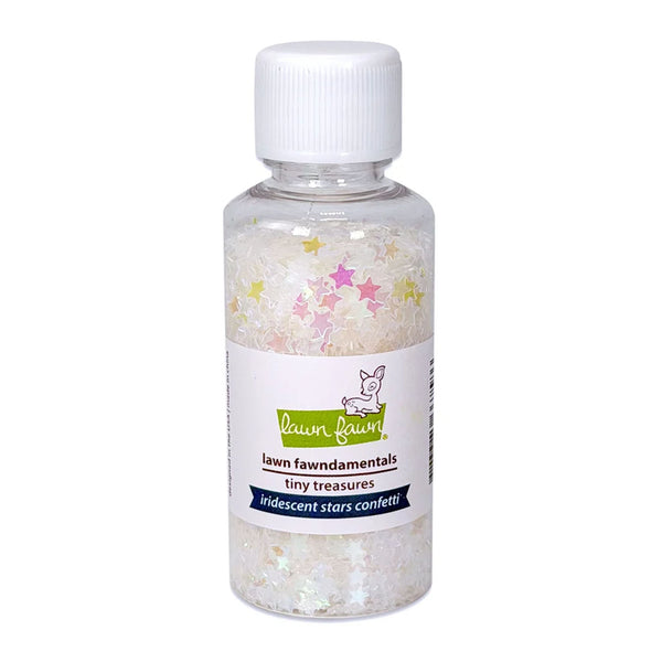 A clear plastic bottle with a white cap containing 'lawn fawndamentals tiny treasures iridescent stars confetti' by Lawn Fawn, filled with shimmering white glitter and multicolored star pieces, on a white background.