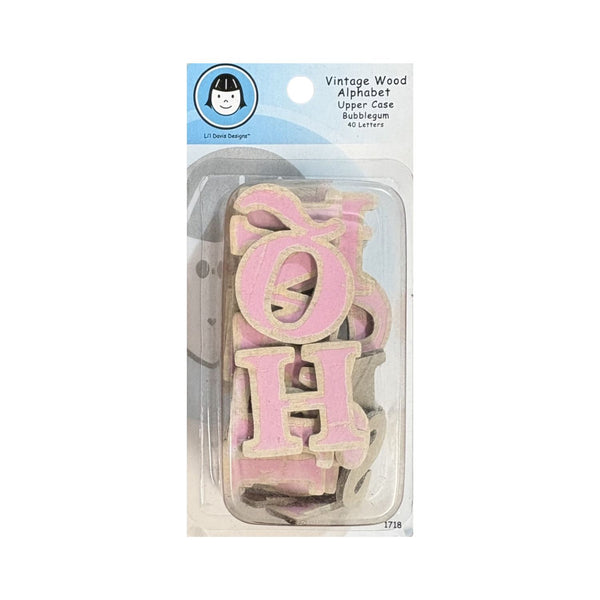 Vintage Wood Alphabet Upper Case Bubblegum set by Linda Bates Designer, featuring 40 distressed pink and beige wooden letters in bubblegum pink, packaged in a clear blister pack with a blue and white header card.