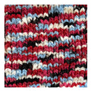Multicolored crocheted fabric with red, blue, white, and black patterns.