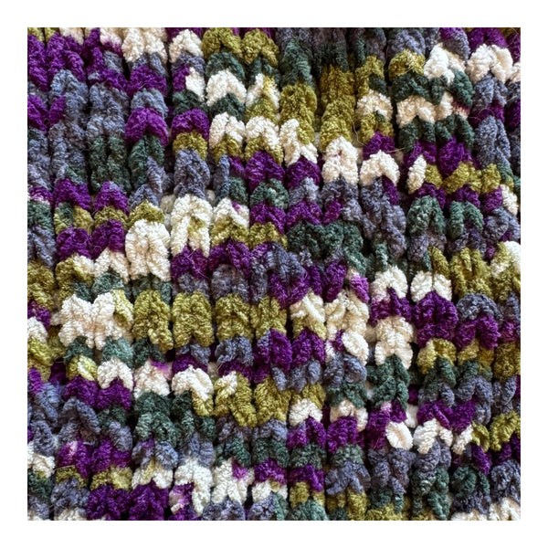 Multicolored crocheted fabric with a textured pattern