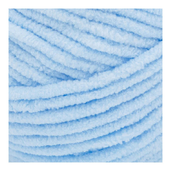 Close-up of light blue yarn with a textured surface