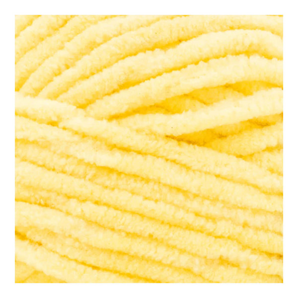Close-up of a ball of yellow yarn