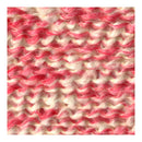 Close-up of pink and beige knitted fabric texture